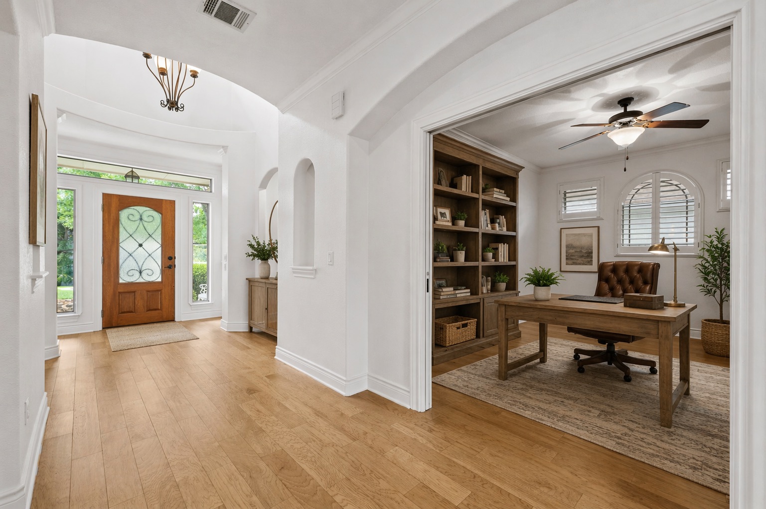 815 River Walk Trail Georgetown, TX 78633 - Photo 3 of 36 This dedicated office at the front of the home is the ideal spot for a quiet reading nook or keeping your daily tasks organized *Virtually staged image