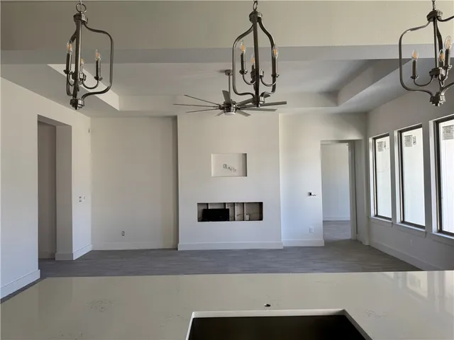 a view of a room with a chandelier