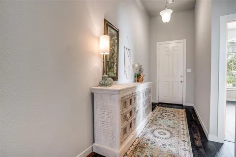 a spacious bathroom with a double vanity sink and a mirror