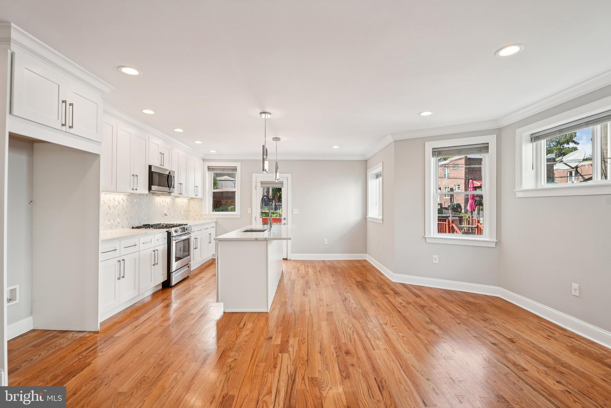 935 East Rittenhouse Street Philadelphia, PA 19138 - Photo 16 of 59 Bright, modern kitchen with hardwood floors.