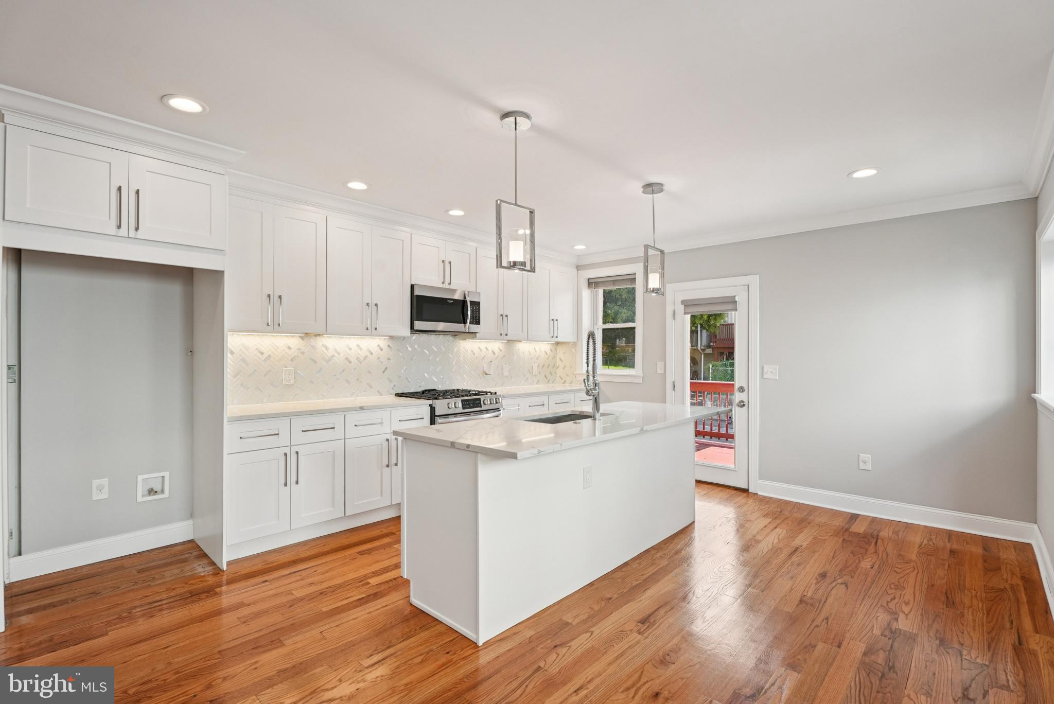 935 East Rittenhouse Street Philadelphia, PA 19138 - Photo 22 of 59 Modern kitchen with sleek finishes.