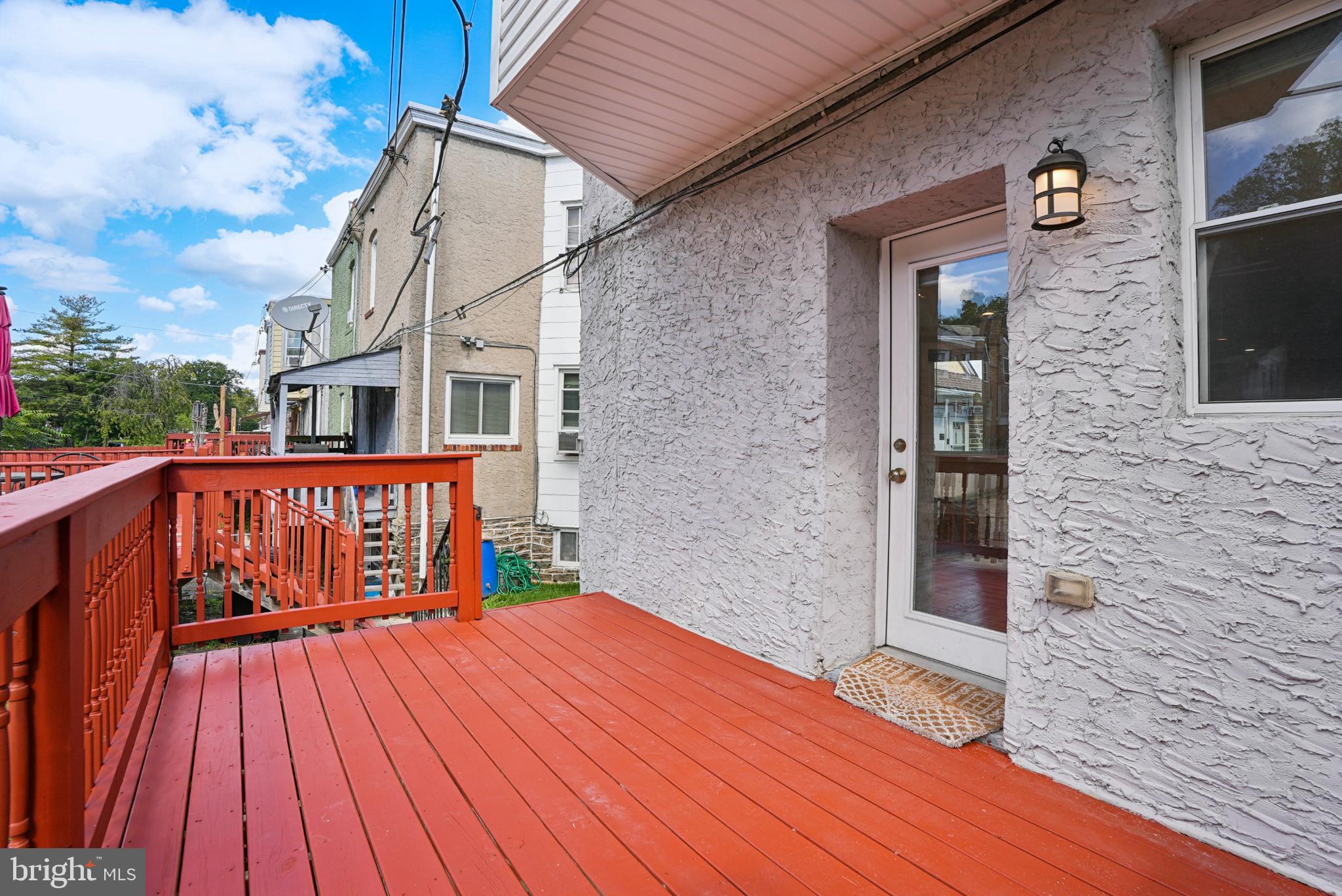 935 East Rittenhouse Street Philadelphia, PA 19138 - Photo 23 of 59 Charming outdoor space with vibrant deck.