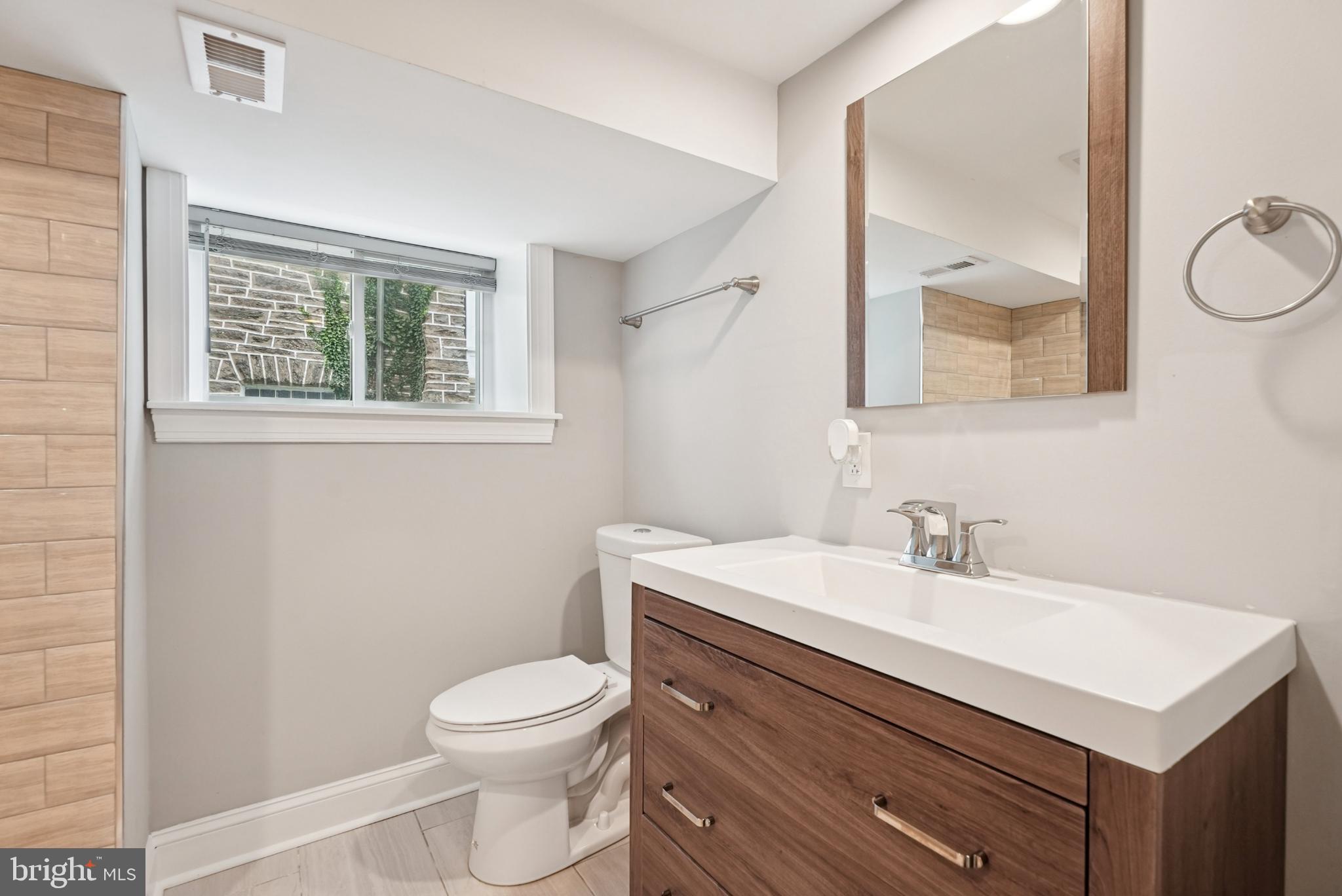 935 East Rittenhouse Street Philadelphia, PA 19138 - Photo 35 of 59 Modern bathroom with natural light.