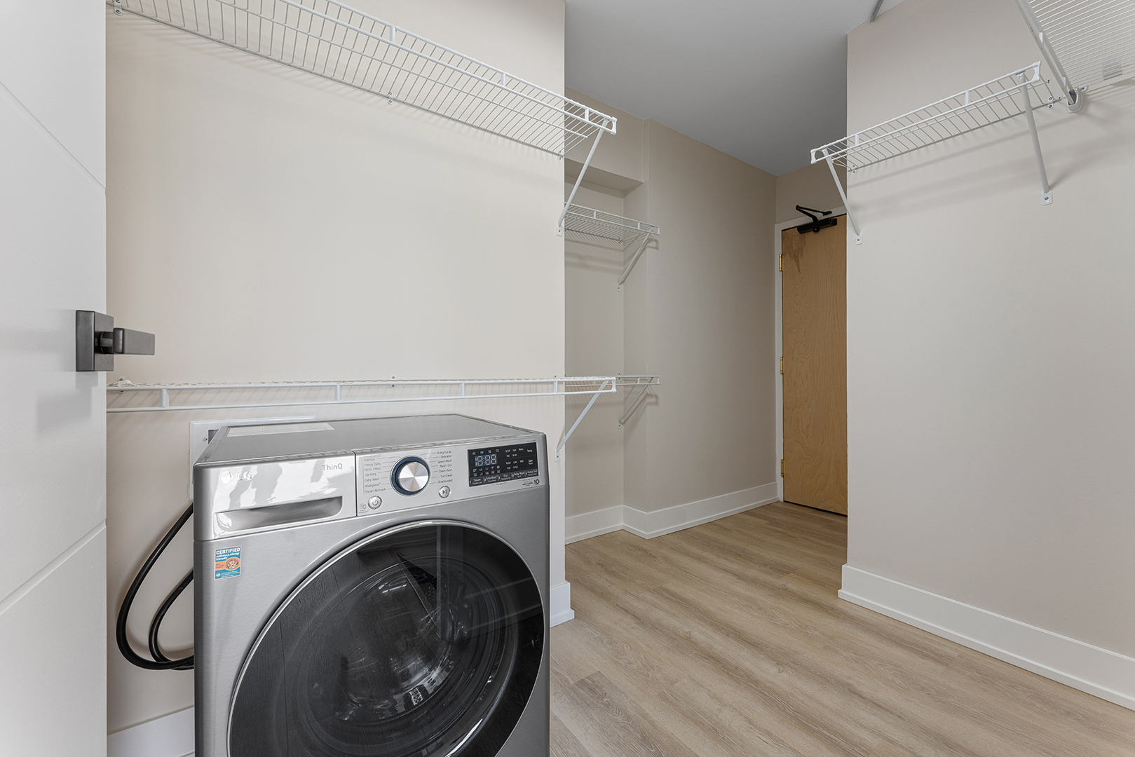 6166 North Sheridan Road, Unit 16A Chicago, IL 60660 - Photo 9 of 17 a view of washer and dryer in a utility room