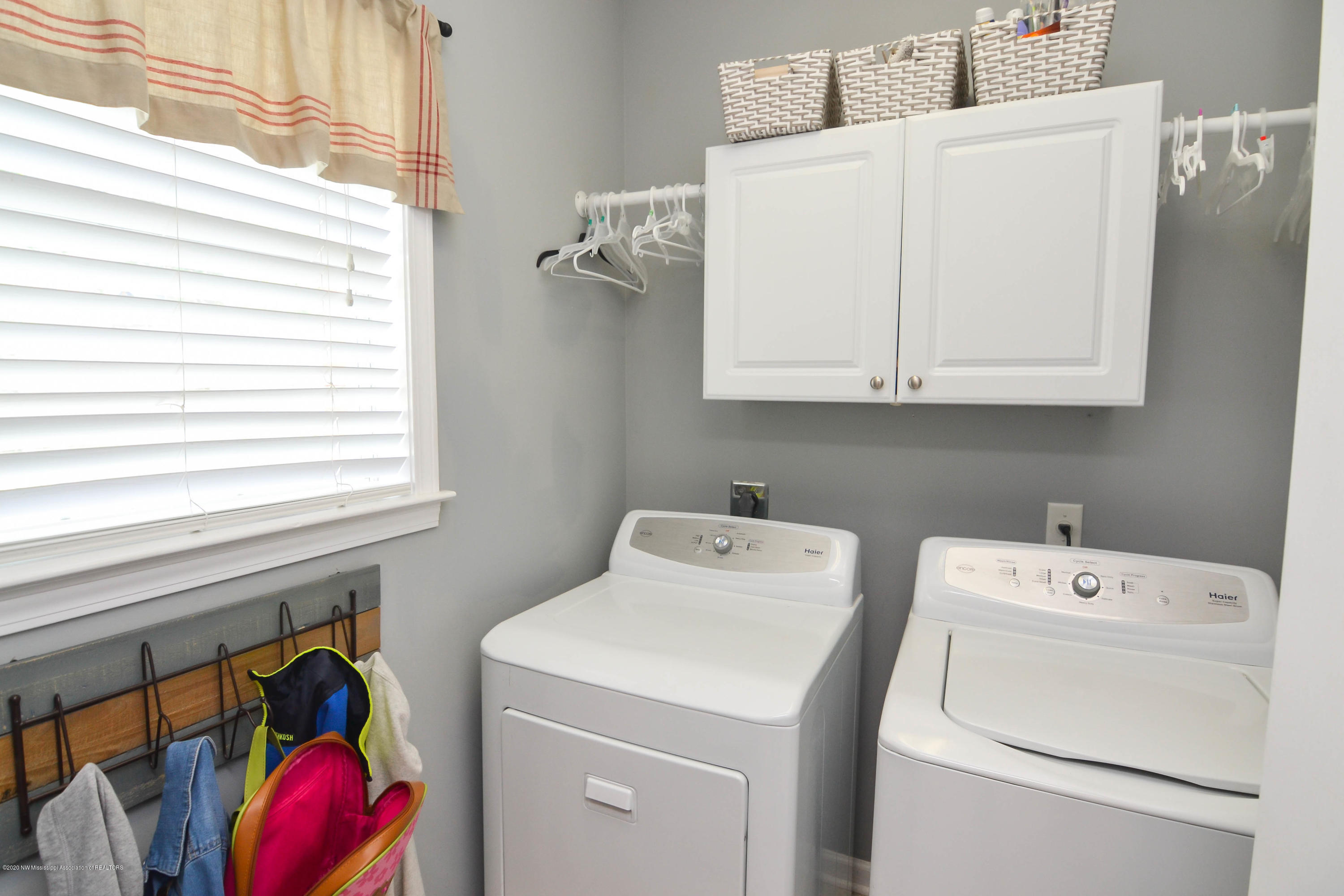 7716 Alexanders Ridge Cove Olive Branch, MS 38654 - Photo 11 of 21 Laundry Room
