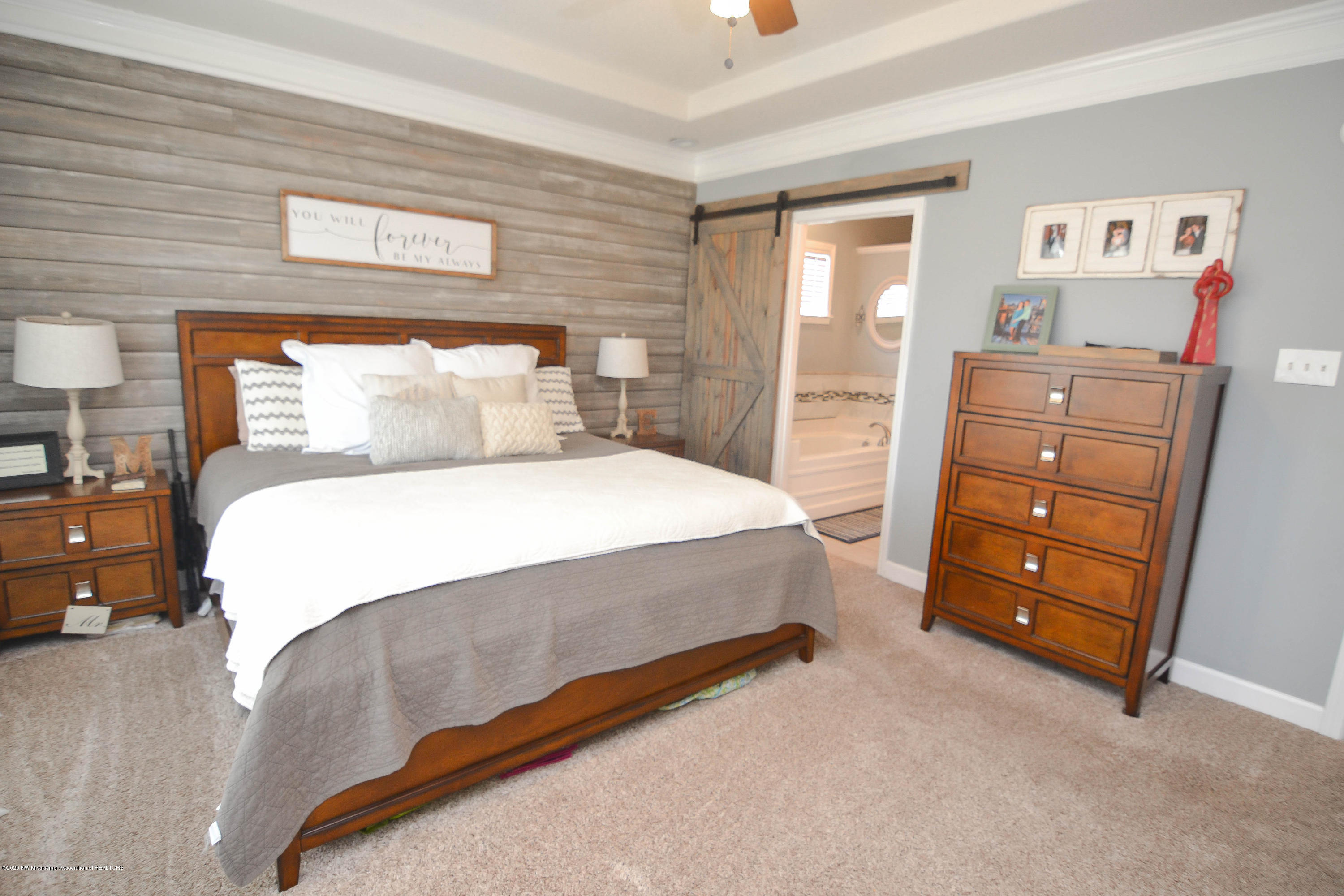 7716 Alexanders Ridge Cove Olive Branch, MS 38654 - Photo 13 of 21 Barn Door to Master Bath