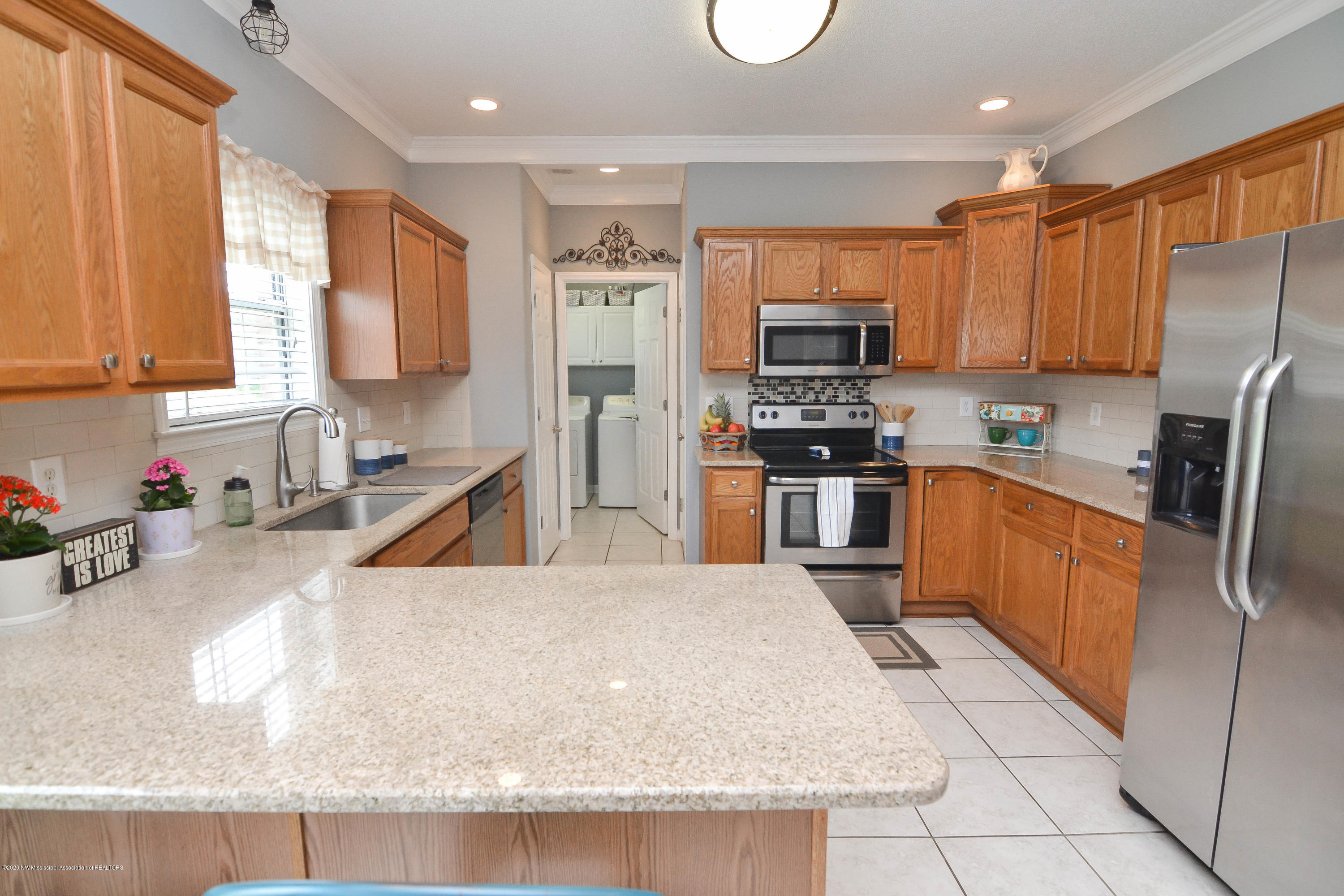 7716 Alexanders Ridge Cove Olive Branch, MS 38654 - Photo 9 of 21 Great Kitchen w/SS Appliances