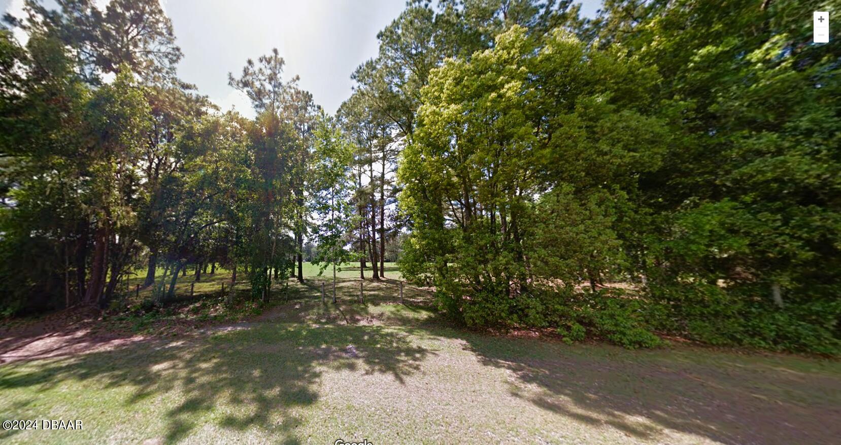 2700 Southeast Maricamp Road Ocala, FL 34471 - Photo 2 of 5 a view of outdoor space and trees