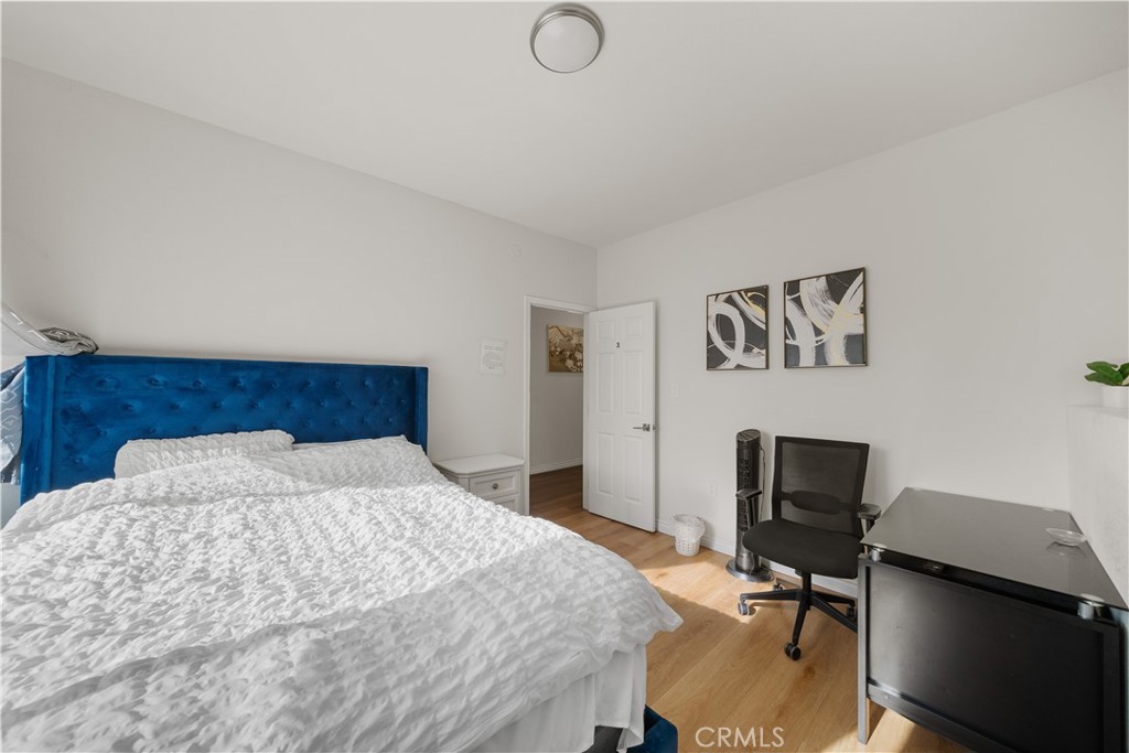 11159 St Tropez Drive Rancho Cucamonga, CA 91730 - Photo 19 of 40 a bedroom with a bed and a desk