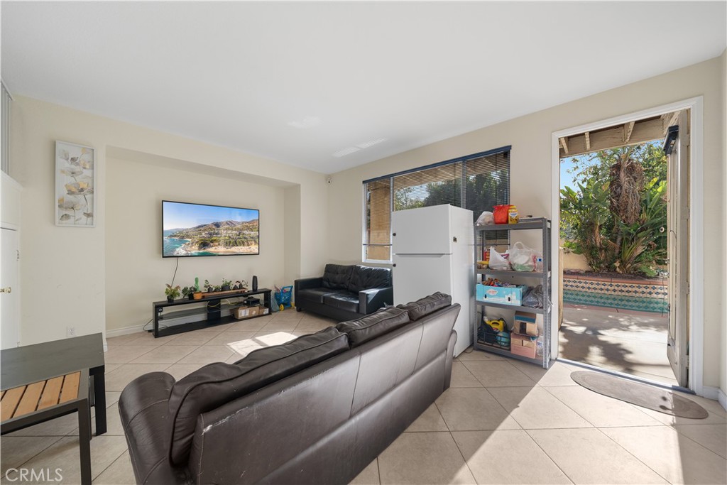 11159 St Tropez Drive Rancho Cucamonga, CA 91730 - Photo 8 of 40 a living room with furniture and a window