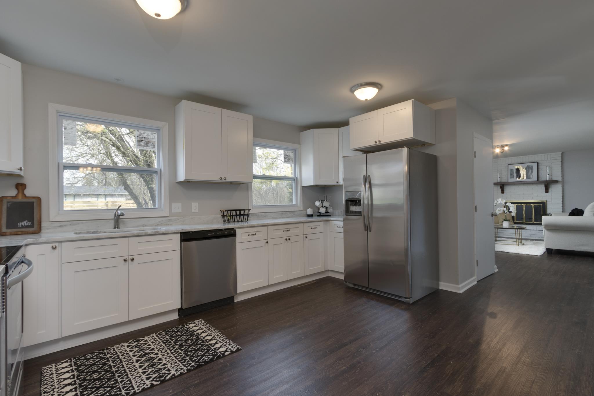 New Granite, Stainless Appliances, Cabinets, Flooring, Paint, Fixtures, and more!