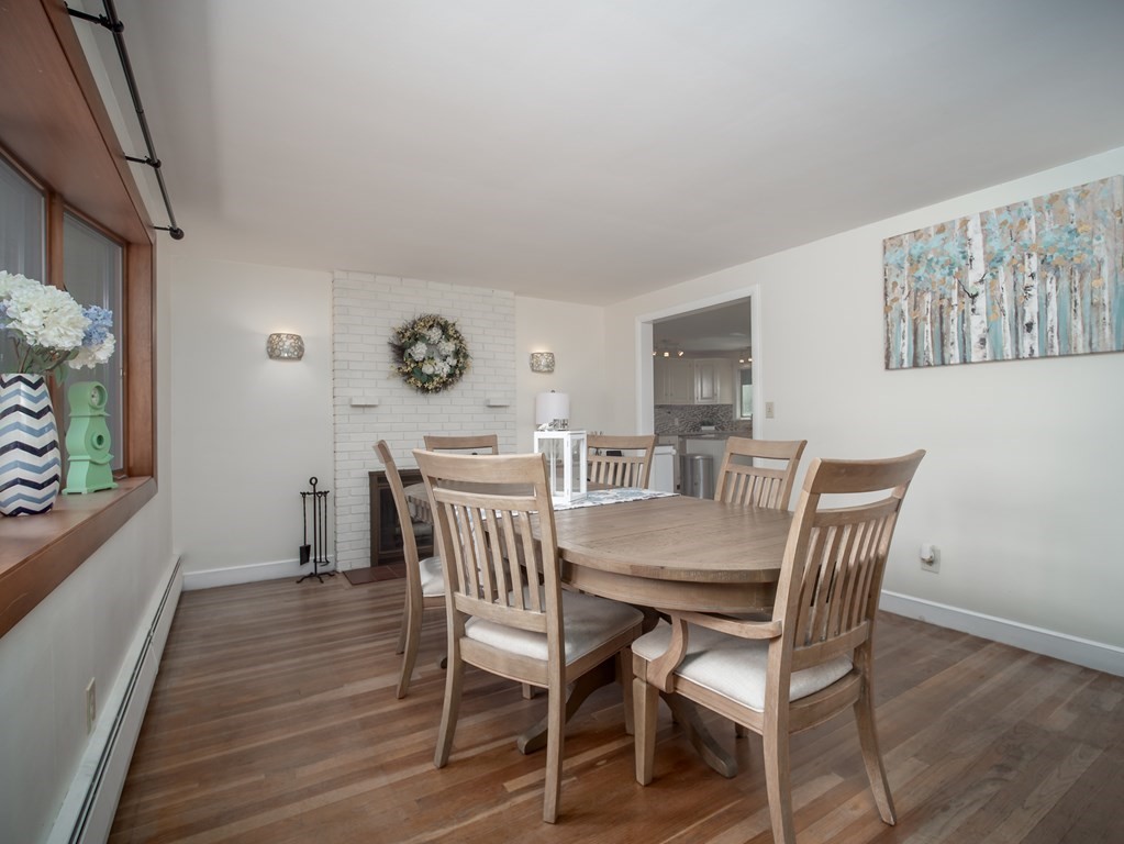 28 Elmfield Road Framingham, MA 01701 - Photo 3 of 37 a view of a dining room with furniture and wooden floor