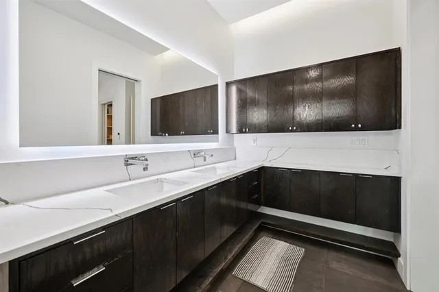 a view of a livingroom with furniture and a garage