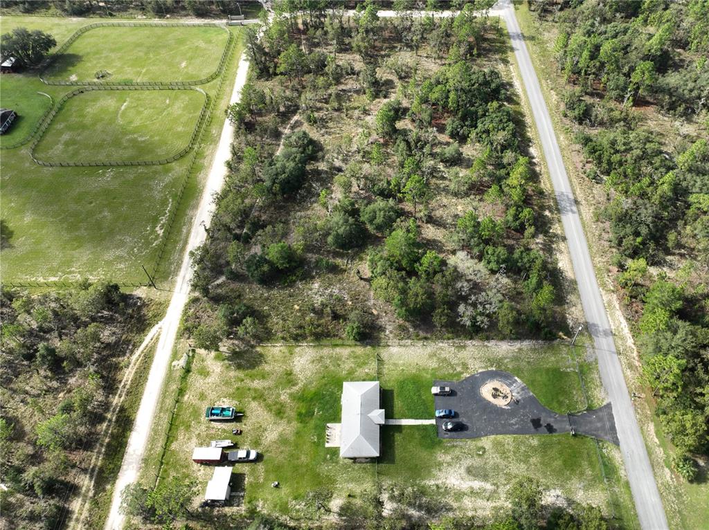Tbd Southeast 129th Court Dunnellon, FL 34431 - Photo 13 of 25 an aerial view of residential houses with outdoor space