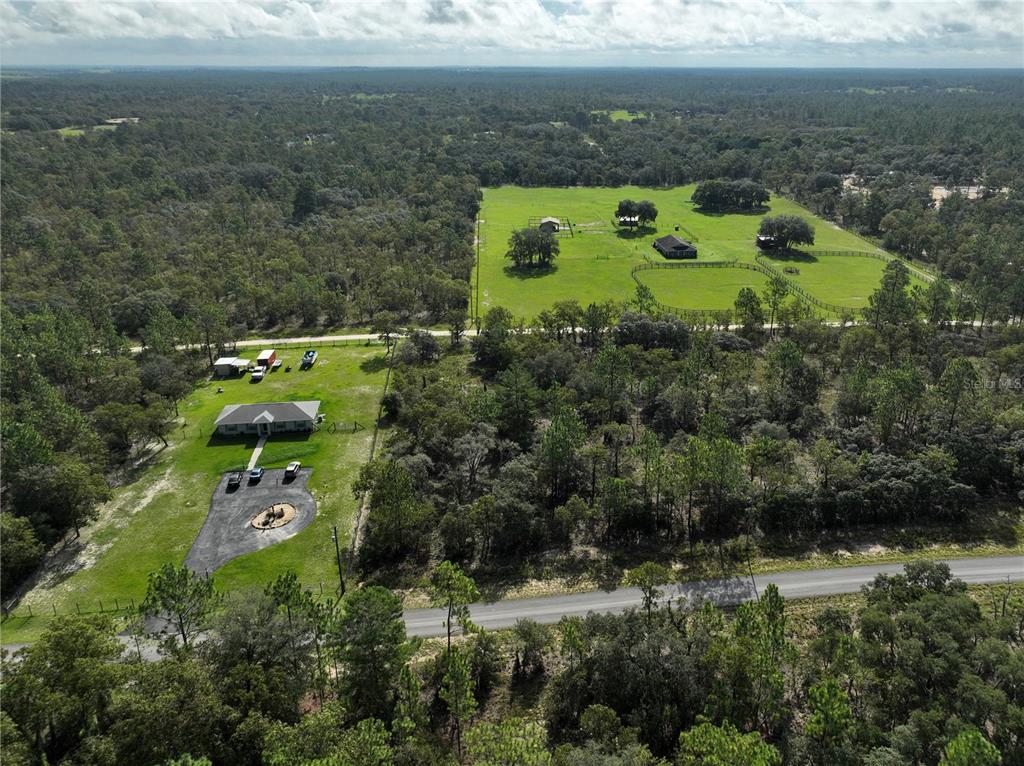 Tbd Southeast 129th Court Dunnellon, FL 34431 - Photo 10 of 25 a aerial view of a house with a yard