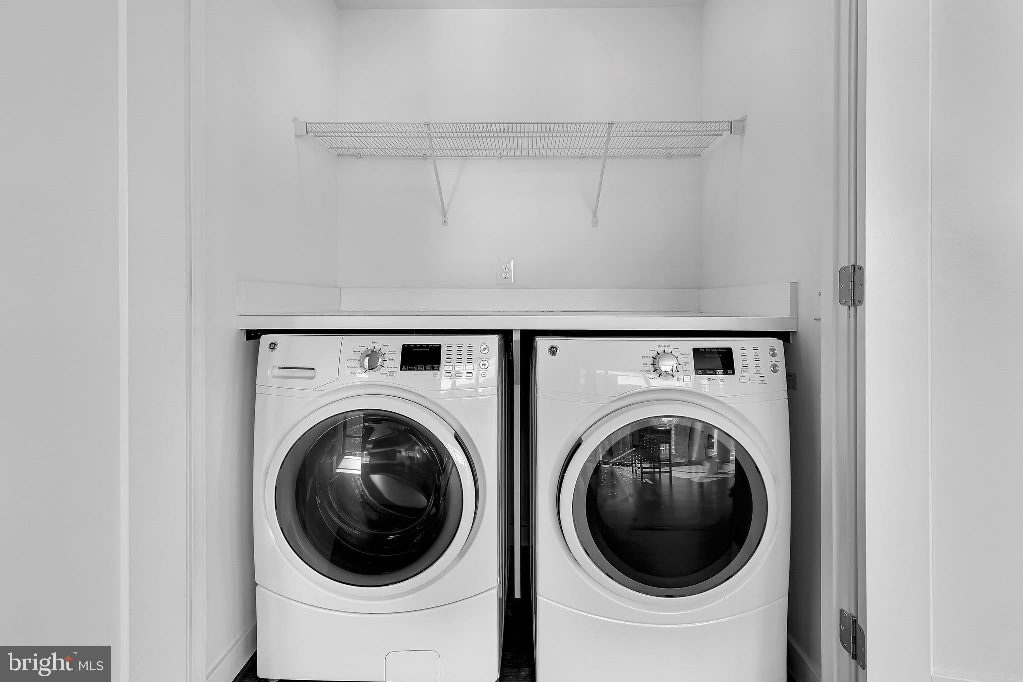 150 I Street Southeast, Unit 1 BR Washington, DC 20003 - Photo 14 of 26 a utility room with dryer and washer