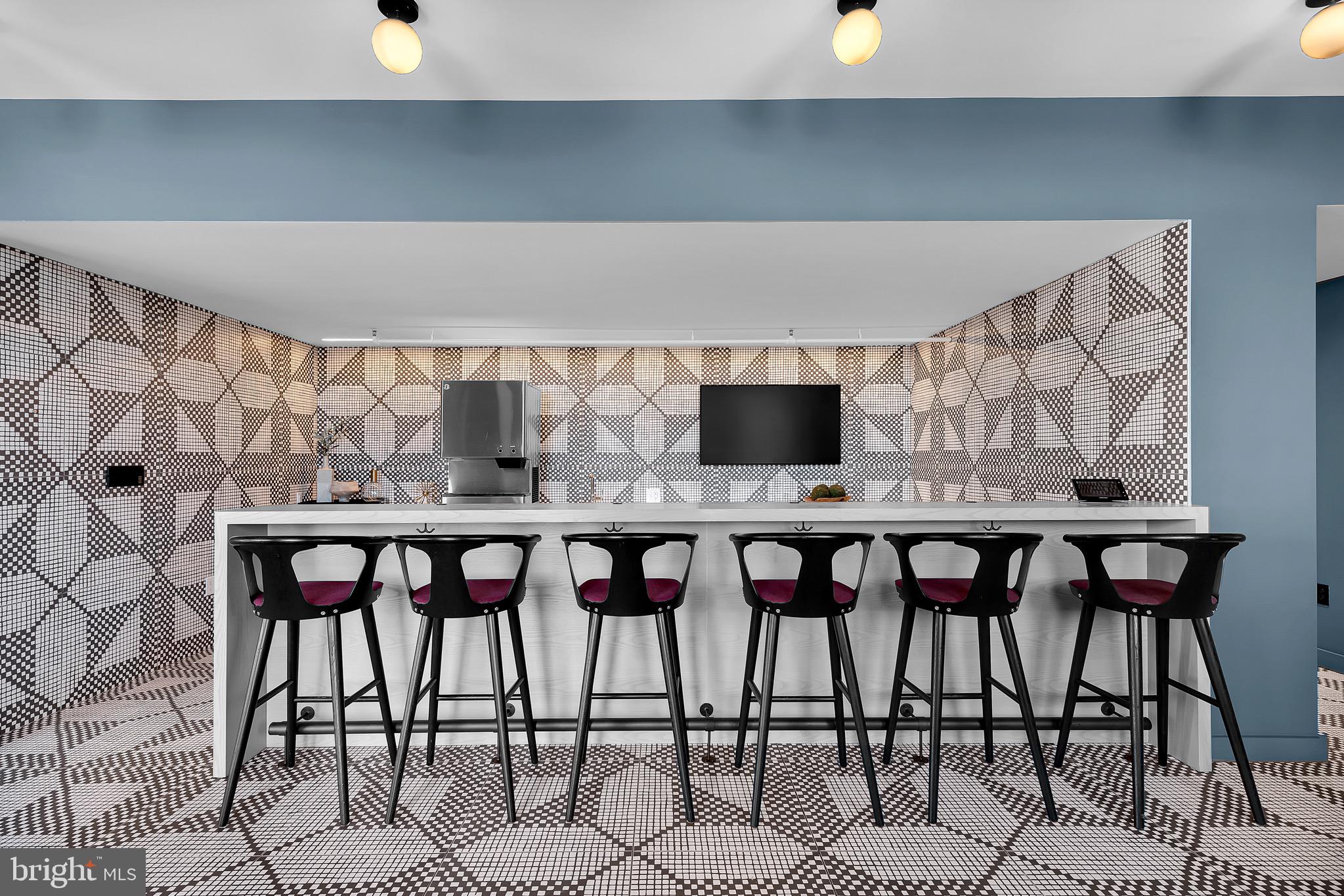 150 I Street Southeast, Unit 1 BR Washington, DC 20003 - Photo 20 of 26 a kitchen with a table and chairs in it
