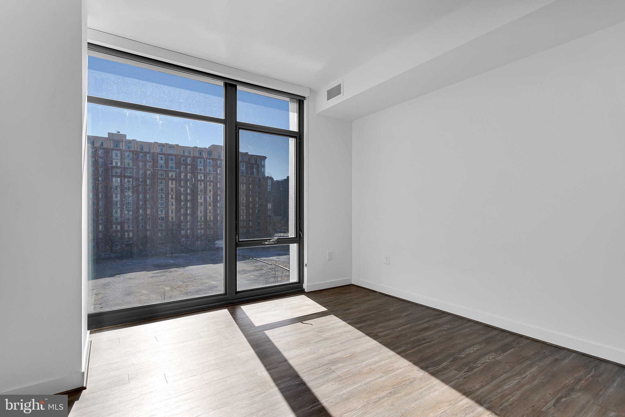150 I Street Southeast, Unit 1 BR Washington, DC 20003 - Photo 8 of 26 a view of a room that has a large window