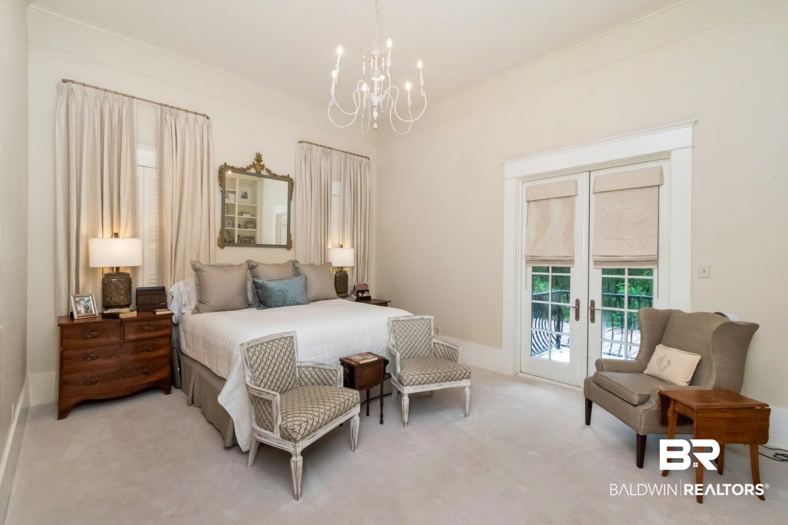4810 Mums Court Mobile, AL 36608 - Photo 22 of 50 Carpeted bedroom with french doors, a chandelier, and access to exterior