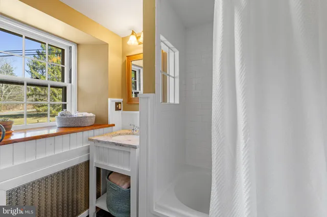 a view of outdoor space with garden and deck