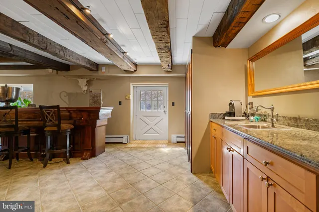 a view of a chairs and table in the patio
