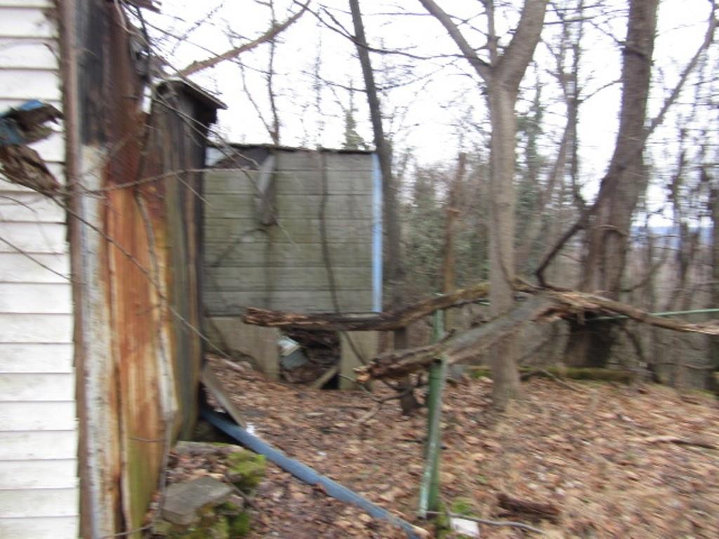 232 Crestview Road Pittsburgh, PA 15235 - Photo 12 of 30 a view of a house with a yard