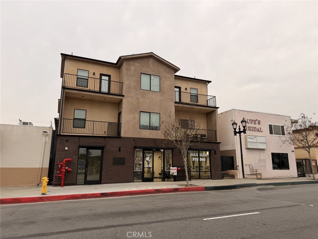 511 North Azusa Avenue, Unit 203 Azusa, CA 91702 - Photo 16 of 16 a view of a street with buildings