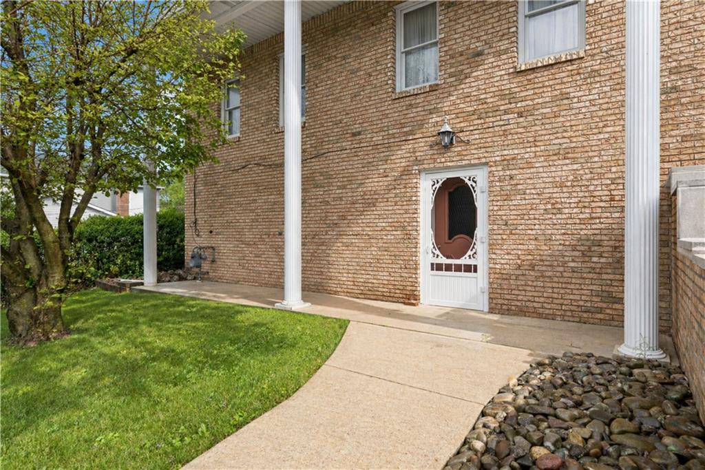 665 Main Street Irwin, PA 15642 - Photo 2 of 28 Covered front patio