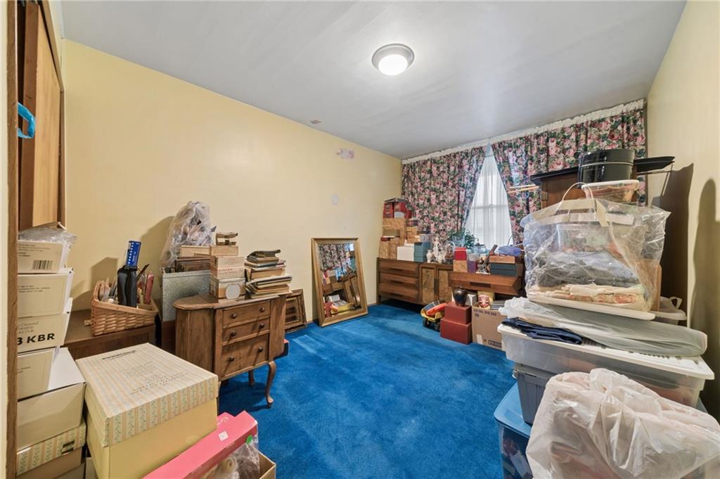 665 Main Street Irwin, PA 15642 - Photo 9 of 28 1st floor Primary Bedroom *not Staged*