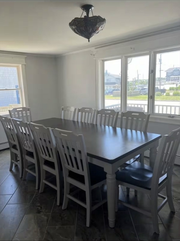 300 Ocean Street Marshfield, MA 02050 - Photo 13 of 30 a view of a dining room with furniture and window
