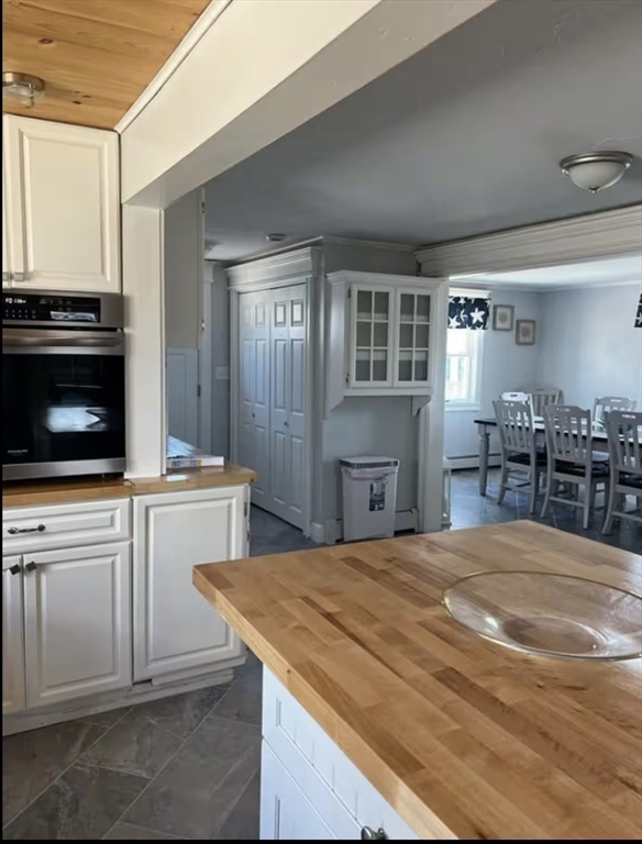 300 Ocean Street Marshfield, MA 02050 - Photo 14 of 30 a kitchen with a stove and cabinets