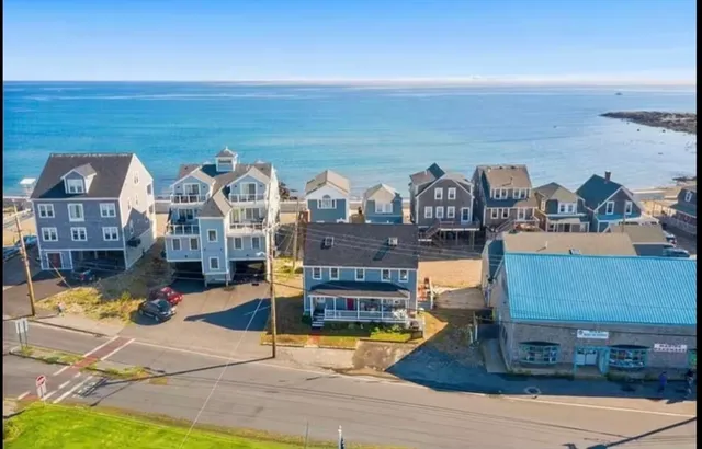 a view of a swimming pool with outdoor seating