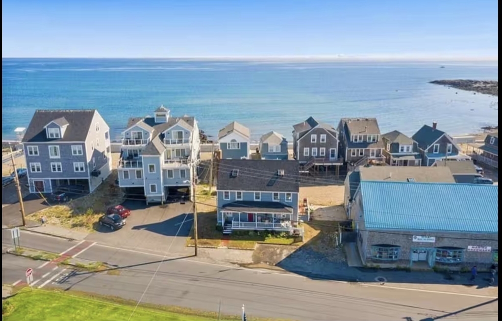 300 Ocean Street Marshfield, MA 02050 - Photo 2 of 30 a view of a swimming pool with outdoor seating