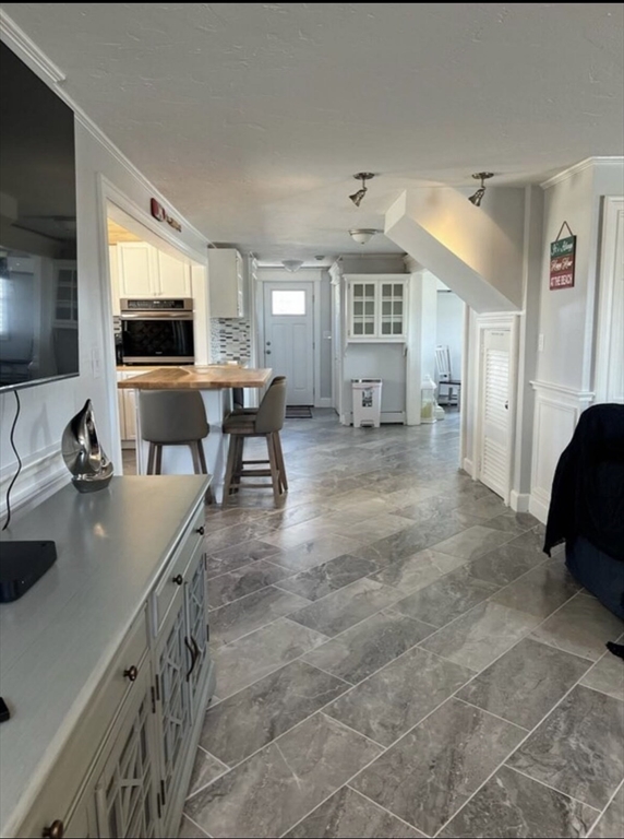 300 Ocean Street Marshfield, MA 02050 - Photo 22 of 30 a living room with furniture and a flat screen tv