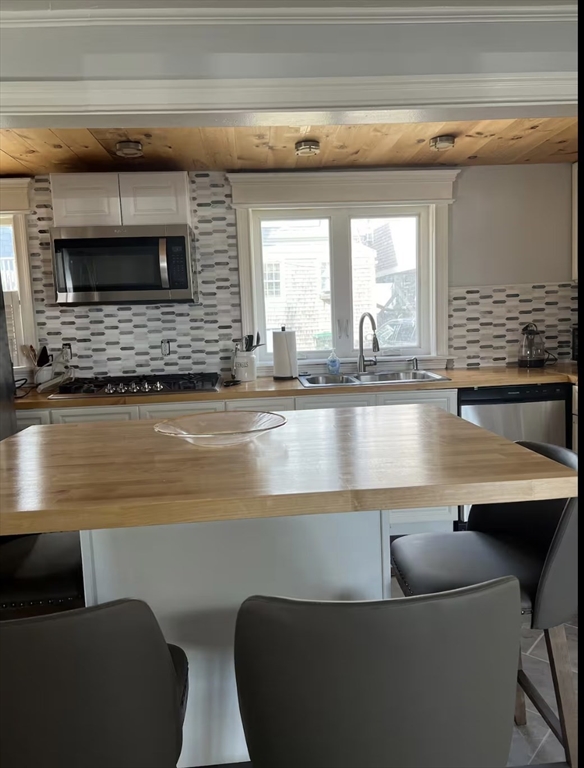 300 Ocean Street Marshfield, MA 02050 - Photo 25 of 30 a living room with furniture and a fireplace