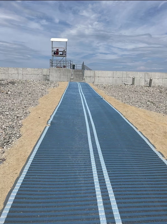 300 Ocean Street Marshfield, MA 02050 - Photo 7 of 30 a view of roof deck with two chairs and wooden floor