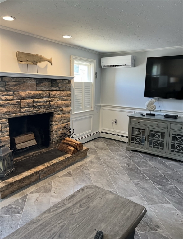 300 Ocean Street Marshfield, MA 02050 - Photo 9 of 30 a living room with furniture and a flat screen tv