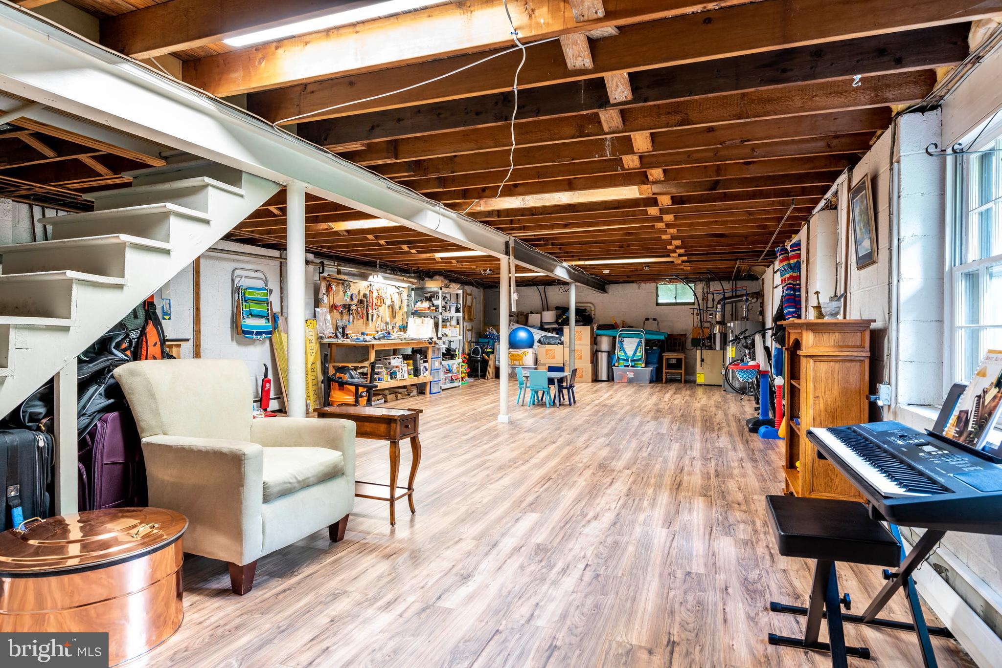 210 Gulph Creek Road Wayne, PA 19087 - Photo 27 of 46 Basement with finished floors & outside access