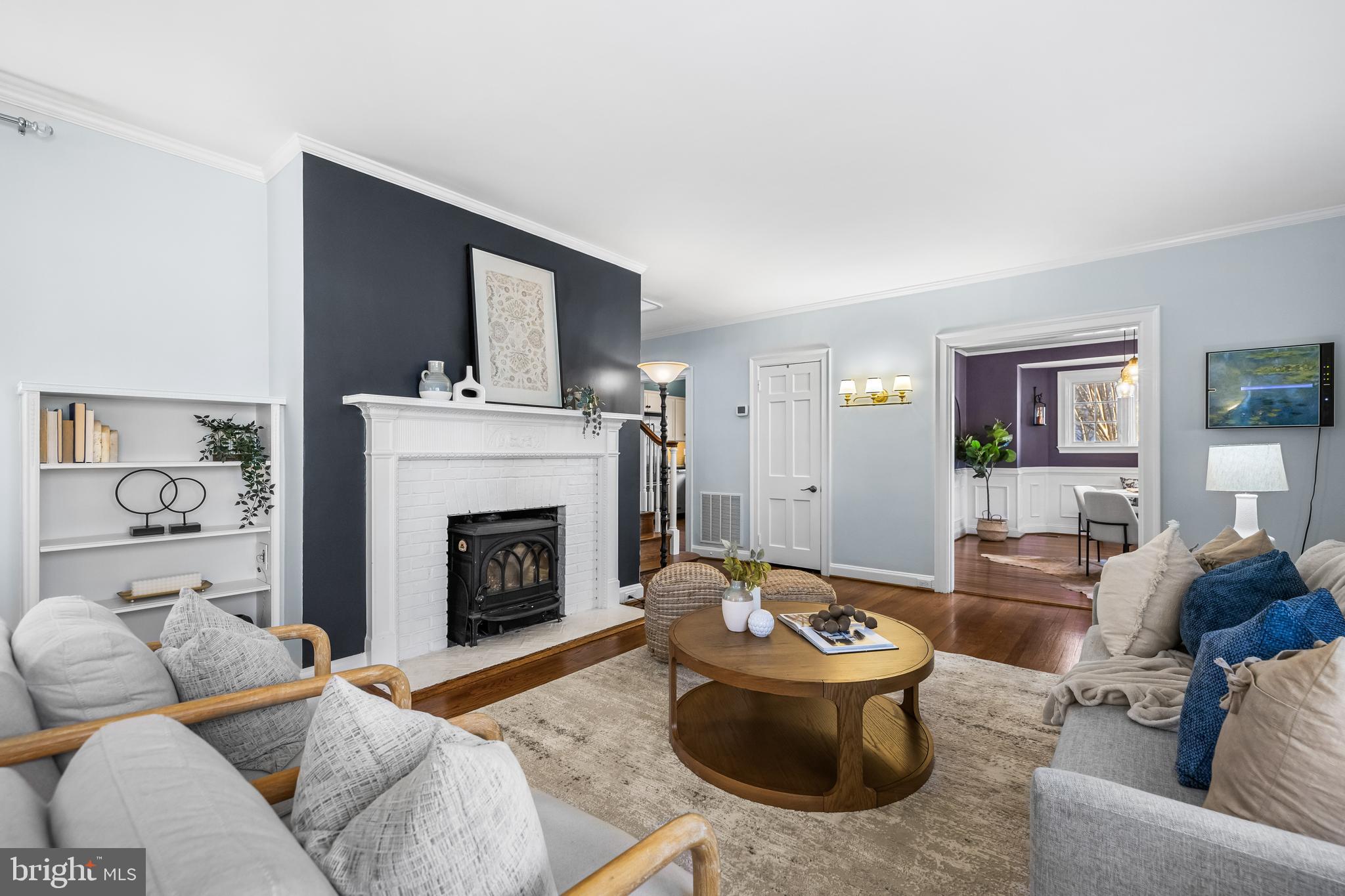 307 East Highfield Road Baltimore, MD 21218 - Photo 11 of 59 a living room with furniture and a fireplace
