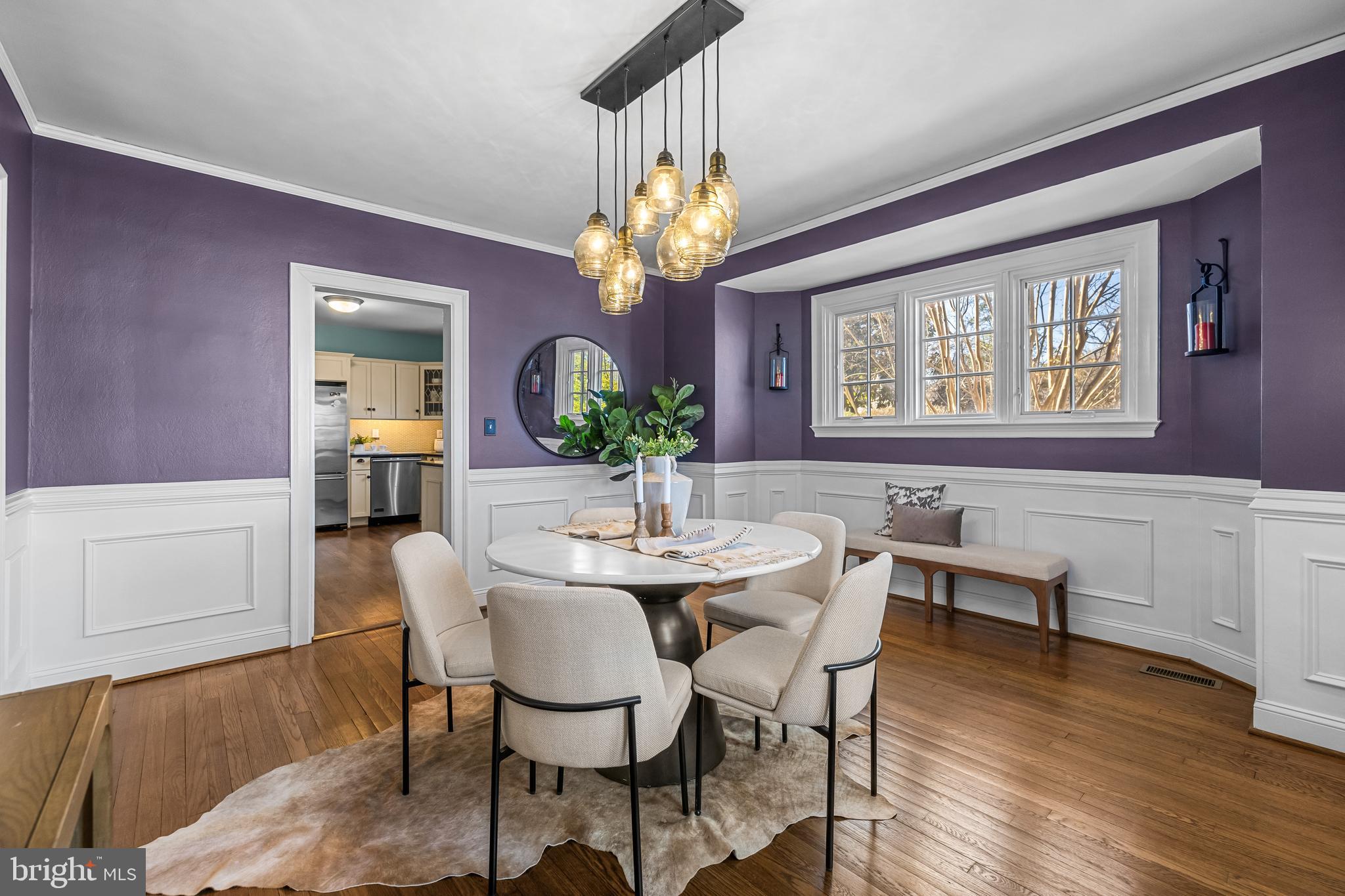 307 East Highfield Road Baltimore, MD 21218 - Photo 20 of 59 a view of a dining room with furniture and wooden floor