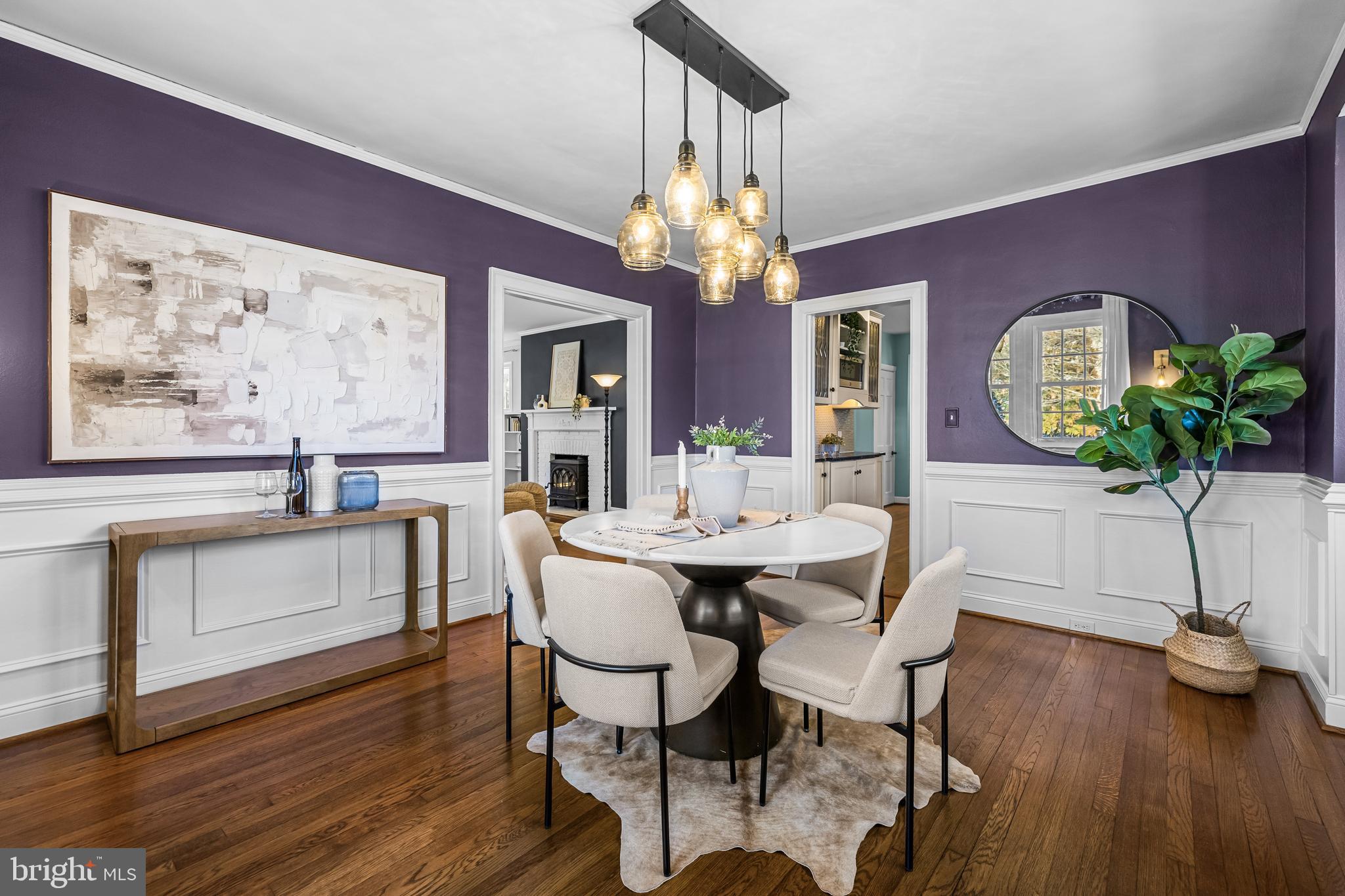 307 East Highfield Road Baltimore, MD 21218 - Photo 21 of 59 a view of a dining room with furniture wooden floor and chandelier