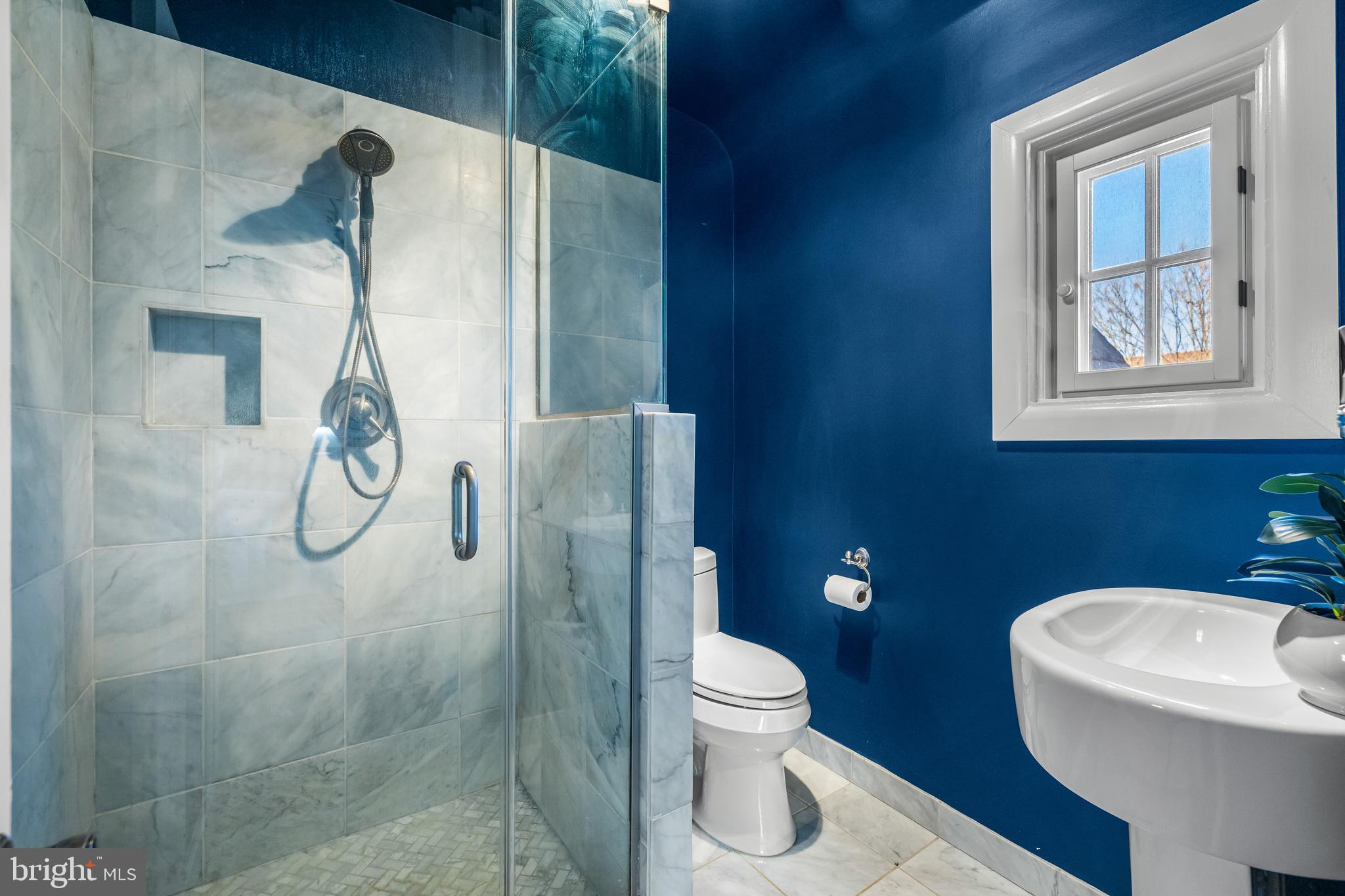 307 East Highfield Road Baltimore, MD 21218 - Photo 36 of 59 a bathroom with a toilet and a shower