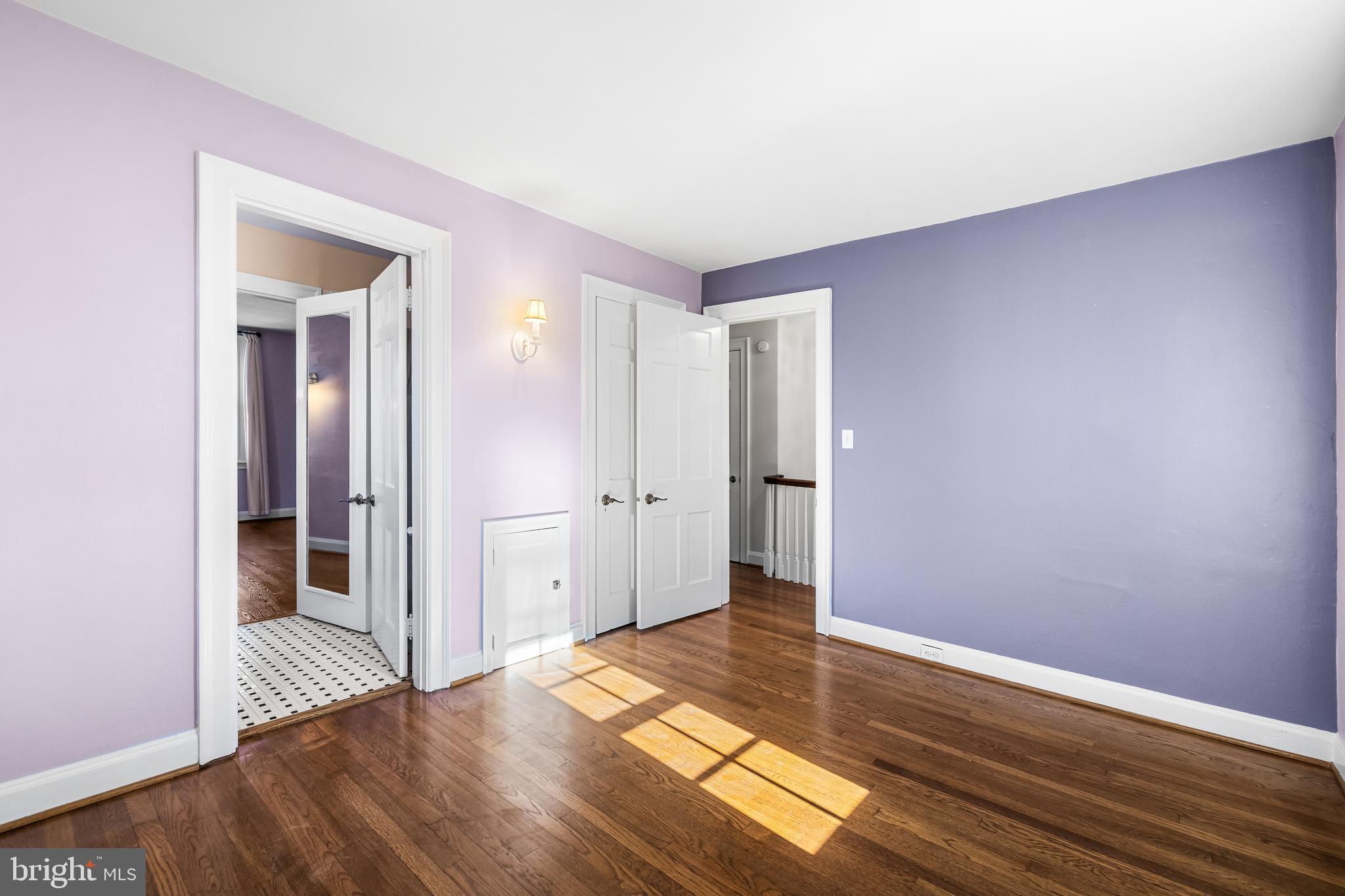 307 East Highfield Road Baltimore, MD 21218 - Photo 40 of 59 a view of empty room with wooden floor