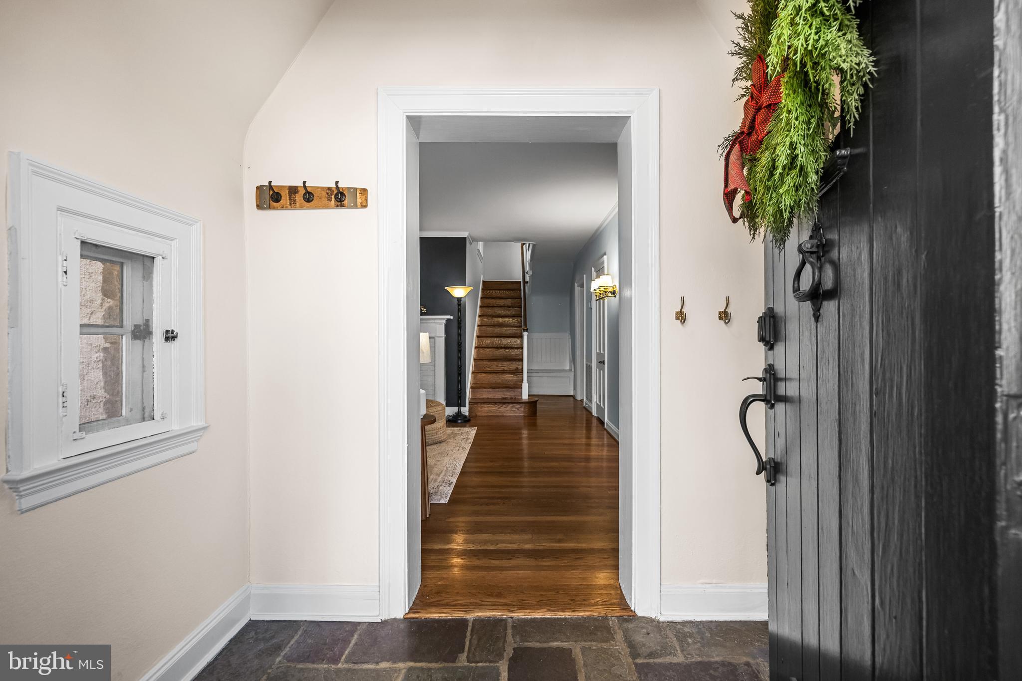 307 East Highfield Road Baltimore, MD 21218 - Photo 5 of 59 a view of a hallway with wooden floor and entryway