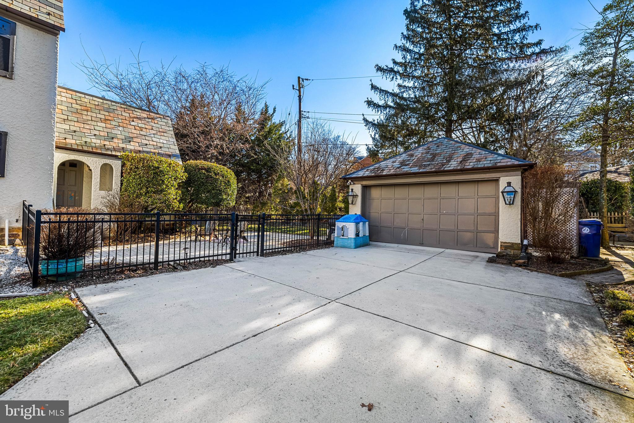 307 East Highfield Road Baltimore, MD 21218 - Photo 57 of 59 a view of a house with a garage and a yard