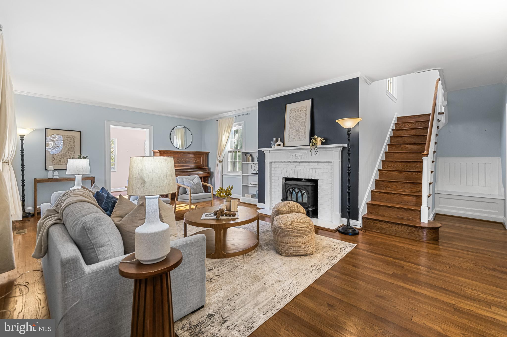 307 East Highfield Road Baltimore, MD 21218 - Photo 6 of 59 a living room with furniture and a fireplace