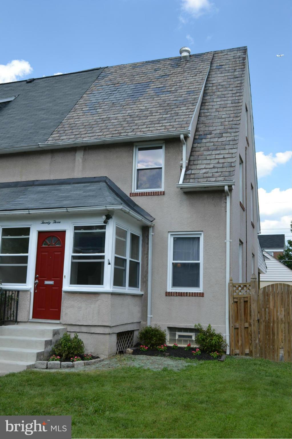 23 Eastship Road Baltimore, MD 21222 - Photo 1 of 30 a front view of a house with a garden