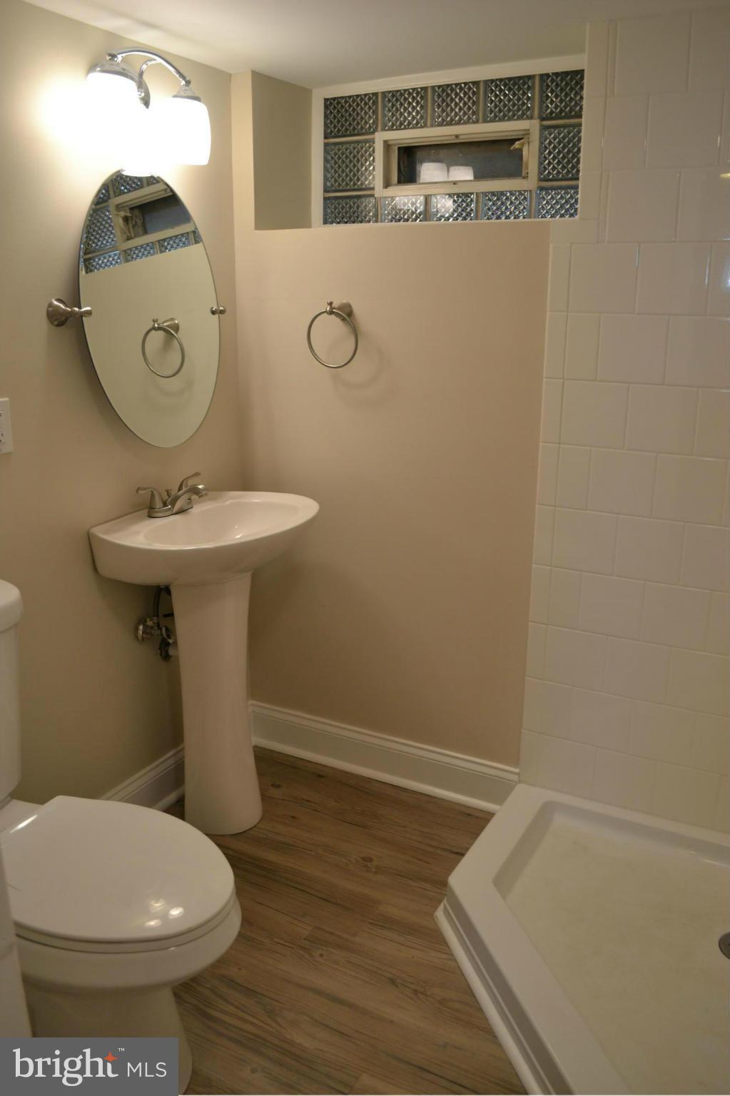 23 Eastship Road Baltimore, MD 21222 - Photo 19 of 30 a bathroom with a toilet and a mirror