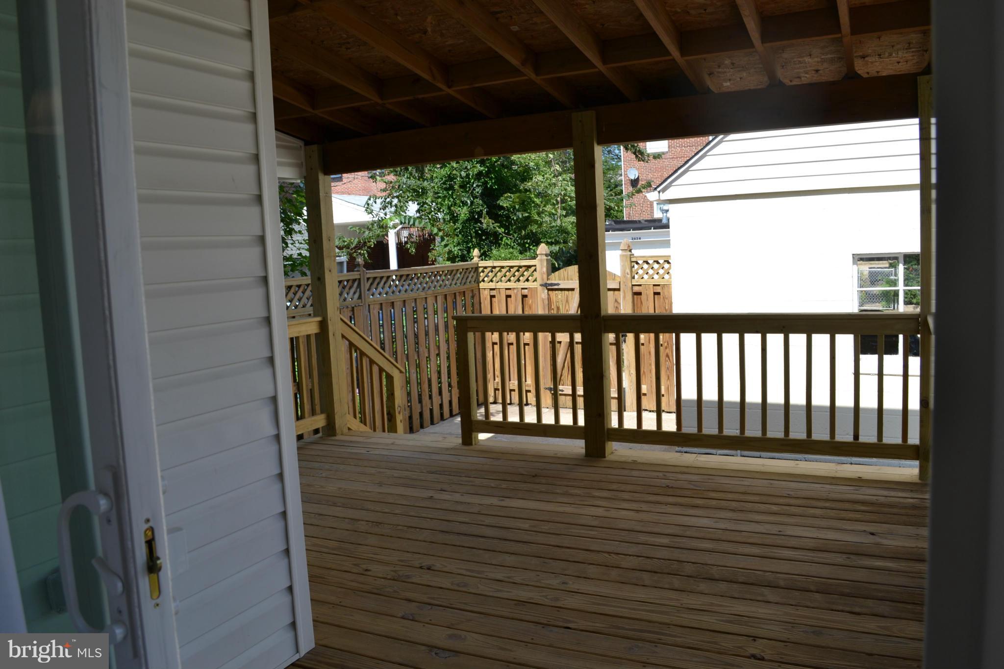 23 Eastship Road Baltimore, MD 21222 - Photo 23 of 30 a view of balcony with wooden floor