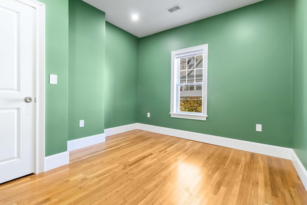 51 Mansfield Street, Unit 49 Everett, MA 02149 - Photo 13 of 31 a view of a room with a ceiling fan and window